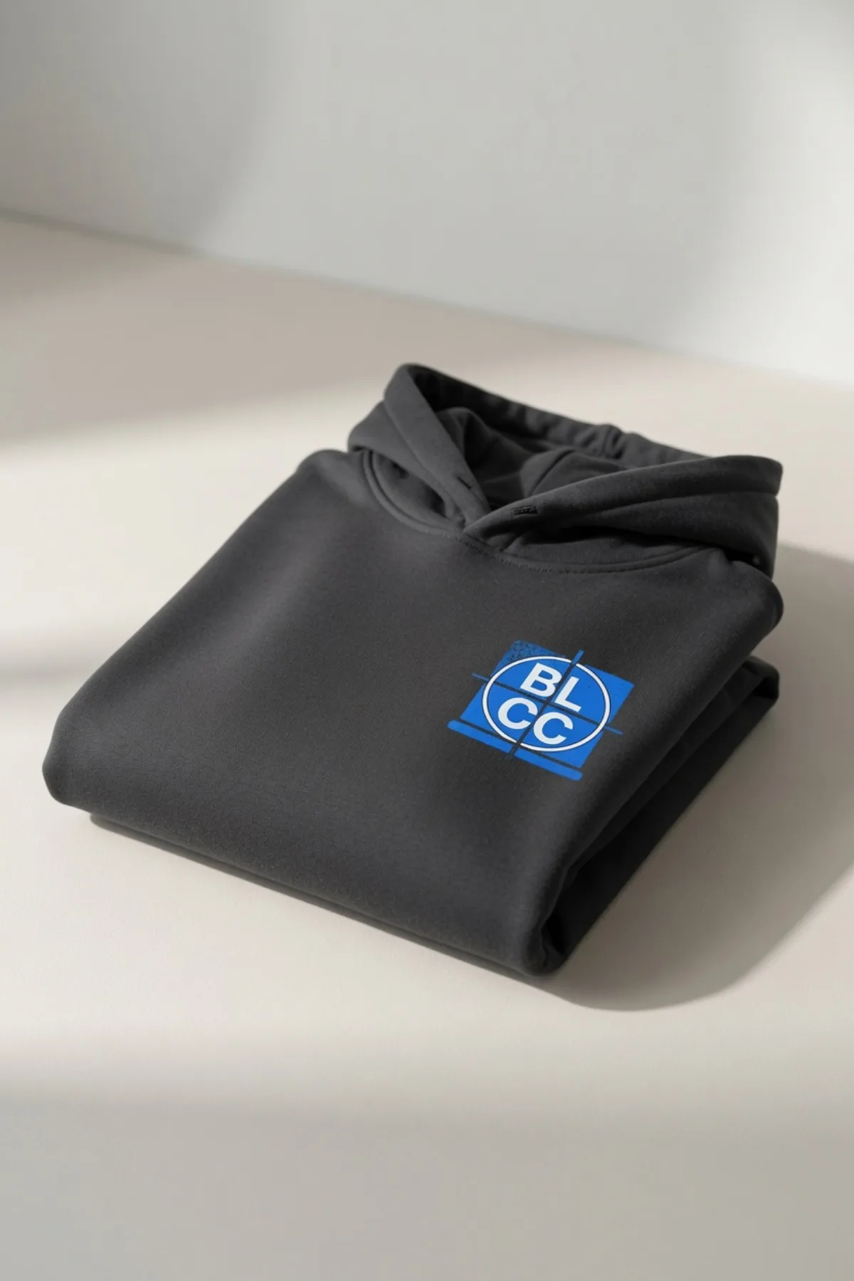Folded charcoal BLCC heavyweight hoodie